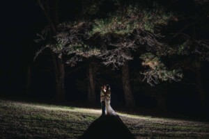 Night shot of bridal & groom at the reception