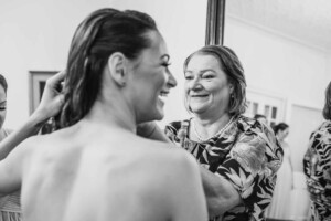 Chapel Hill Wedding - Bride's mother helping her get ready