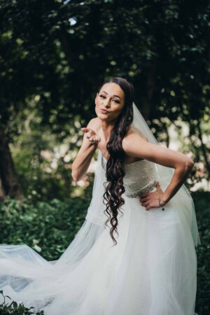 Chapel Hill Wedding - Bride blows a kiss to the camera