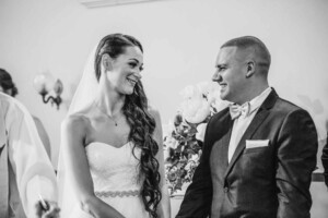 The bride and groom chatting after the ceremony