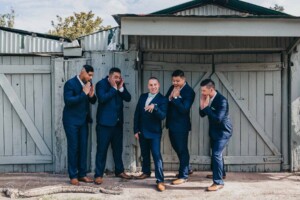 Groomsmen getting girly over the grooms ring
