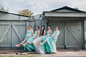 The bridal party show some leg in a candid shot