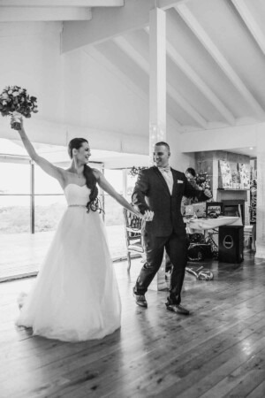 Newlyweds enter the wedding reception