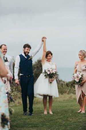 Newlyweds cheer as they're announced as Mr & Mrs