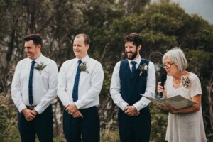 A groom standing with his groomsmen