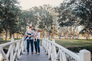 A family Photography session on a bridge in a Sydney park