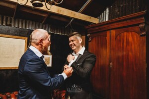 Gledswood Wedding - A groom shares a joke with his dad as they prepare for the wedding ceremony