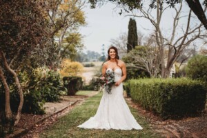 Gledswood Wedding - Bridal portrait, holding her wedding bouquet in the gardens of Gledswood Estate