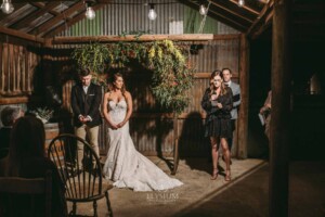 Gledswood Wedding - A wedding guest performs a reading in front of guests during the ceremony