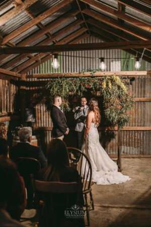 Gledswood Wedding - David Lang celebrant officially marring a couple during their wedding ceremony at Gledswood estate