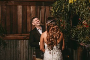 Gledswood Wedding - A groom laughs as he says his vows during their wedding ceremony