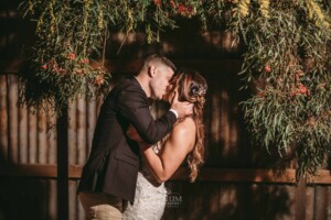 Gledswood Wedding - A bride and groom share their first kiss as husband and wife during the ceremony