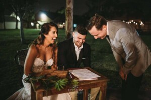 Gledswood Wedding - A bride and groom sign the marriage certificate after the ceremony
