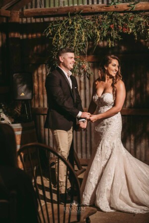 Gledswood Wedding - A bride and groom filled with delight as they are announced to their guests as married