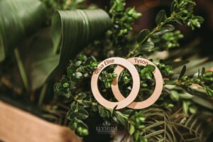 Gledswood Wedding - Bride and groom name cards sit amongst greenery