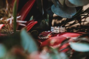 Gledswood Wedding - Wedding rings set amongst the brides bouquet