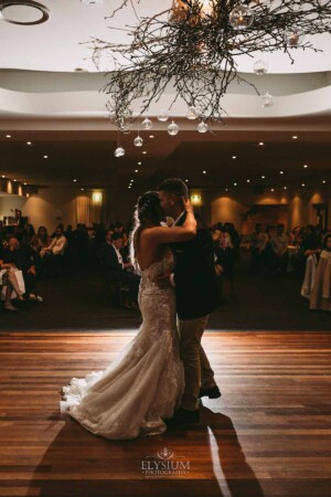Gledswood Wedding - Bride and groom share their first dance during the wedding reception