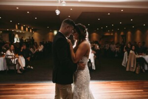 Gledswood Wedding - Bride and groom share their first dance during the wedding reception