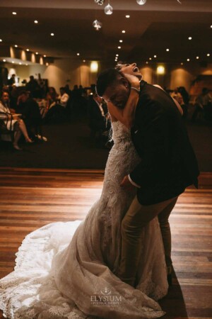 Gledswood Wedding - Bride and groom share their first dance during the wedding reception