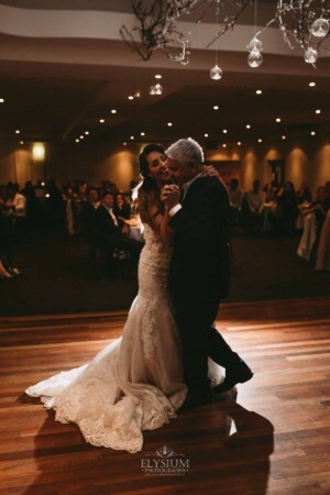 Gledswood Wedding - A bride dances with her father during the wedding reception