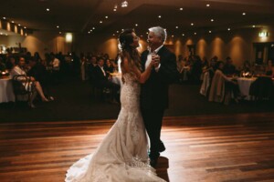 Gledswood Wedding - A bride dances with her father during the wedding reception