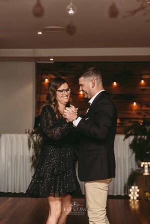 Gledswood Wedding - A groom dances with his mother during the wedding reception