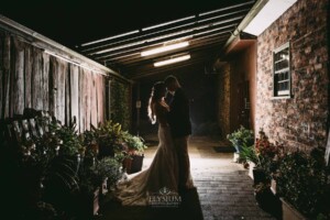 Gledswood Wedding - Backlit night photograph of a bride and groom after their Gledswood estate wedding
