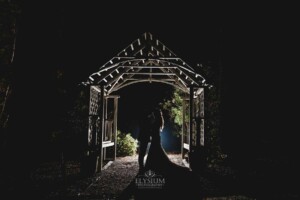 Gledswood Wedding - Backlit night photograph of a bride and groom after their Gledswood estate wedding