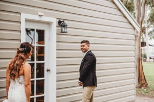 Gledswood Wedding - A groom turns and sees his bride for the first time before the wedding ceremony