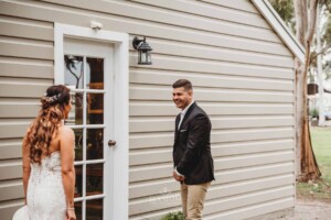 Gledswood Wedding - A groom turns and sees his bride for the first time before the wedding ceremony