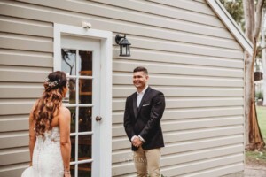 Gledswood Wedding - A groom turns and sees his bride for the first time before the wedding ceremony