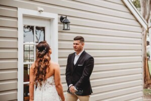 Gledswood Wedding - A groom turns and sees his bride for the first time before the wedding ceremony