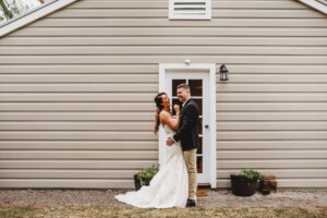 Gledswood Wedding - A bride and groom hug during their first look before the wedding ceremony at Gledswood