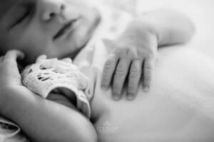 Newborn session - a baby hand showing the details in her tiny fingers