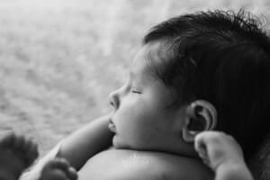 Newborn session - a sleeping baby side profile details