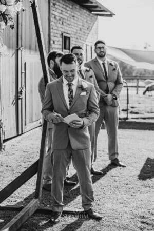Gledswood Wedding - groom reads through his vows before the ceremony