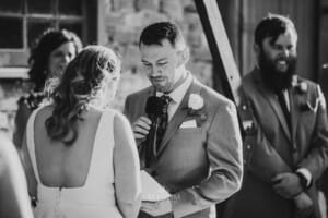 Gledswood Wedding - groom reads his vows during the ceremony