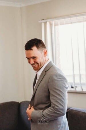 Gledswood Wedding - groom getting ready before the ceremony