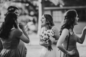 Gledswood Wedding - bride greets guests after the ceremony
