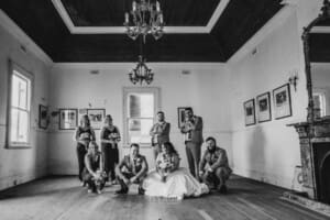 Gledswood Wedding - bridal party poses in the music room of the venue