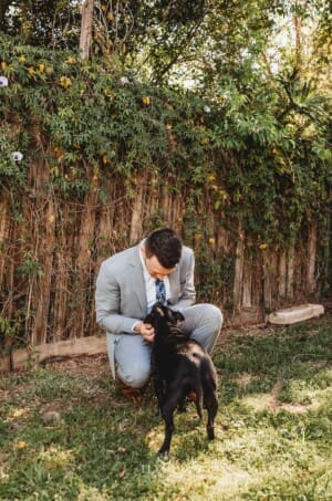 Gledswood Wedding - groom spends time with his dog before the ceremony