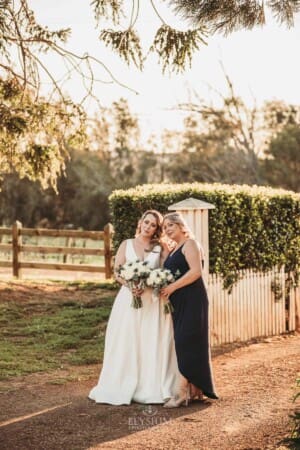 Gledswood Wedding - bridal stands with her bridesmaid