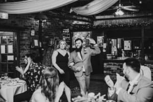 Gledswood wedding - the bridal party dance as they enter the reception