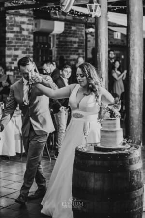 Gledswood wedding - bride and groom dance as they enter the reception