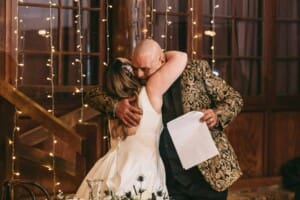 Gledswood wedding - bride hugs her father after his speech