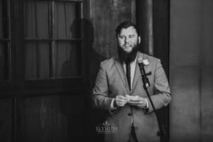 Gledswood wedding - groomsman makes a speech to the bride and groom during the reception