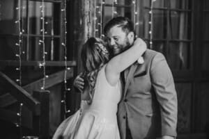 Gledswood wedding - bride hugs a groomsman after his speech