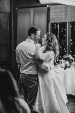 Gledswood wedding - newlyweds look lovingly at each other during their first dance