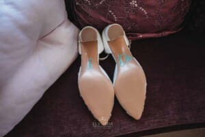 Gledswood Wedding Photo - Brides shoes with I DO written on the sole