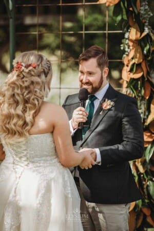 Gledswood Wedding Photo - bride and groom exchange wedding vows